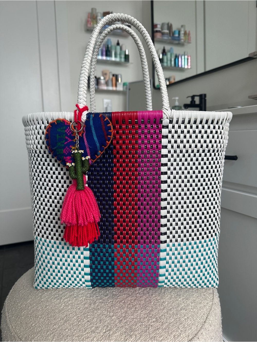 White & Multicolor Woven Tote Bag with Pink Tassel Charm